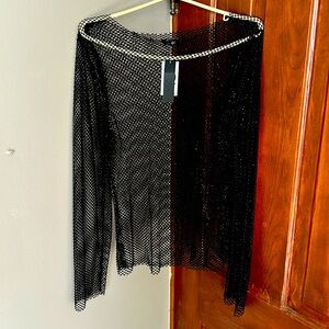 Women’s shirt with rhinestones. It’s see through, great for going out.